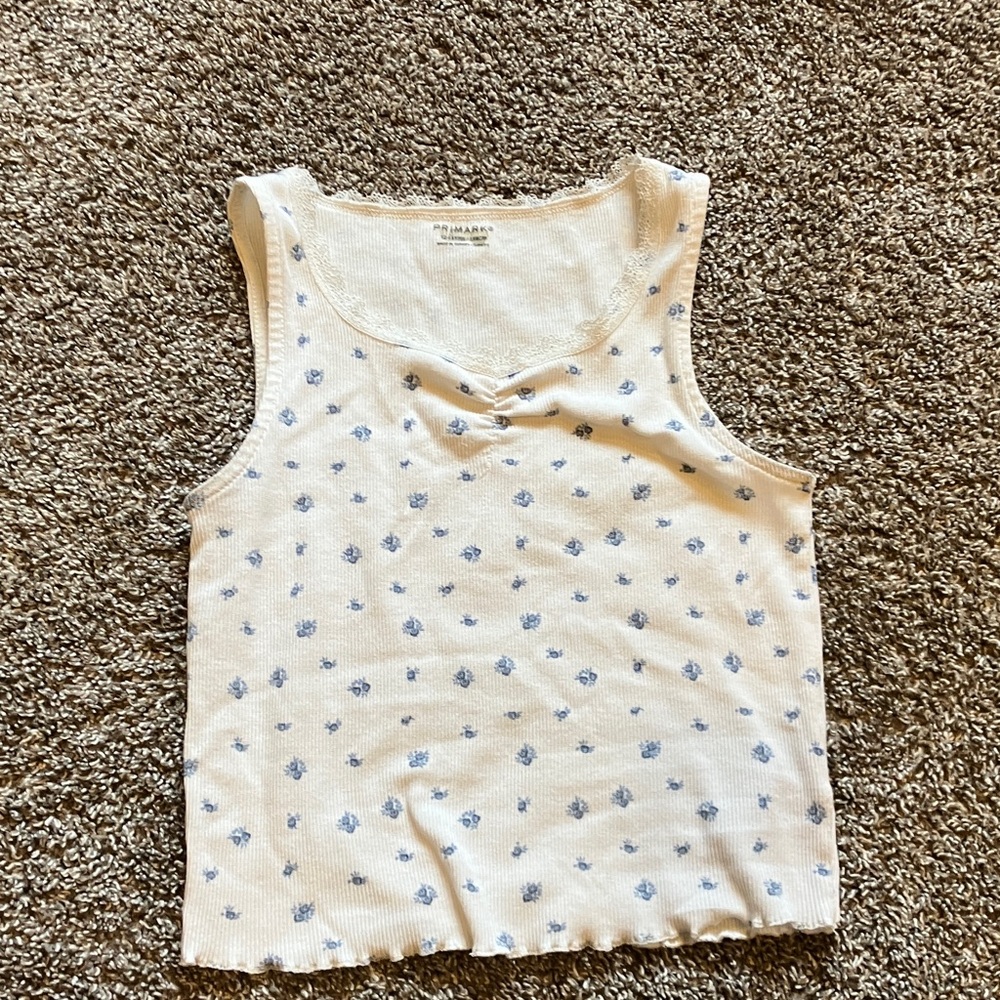 White Tank Top with Blue Floral Pattern